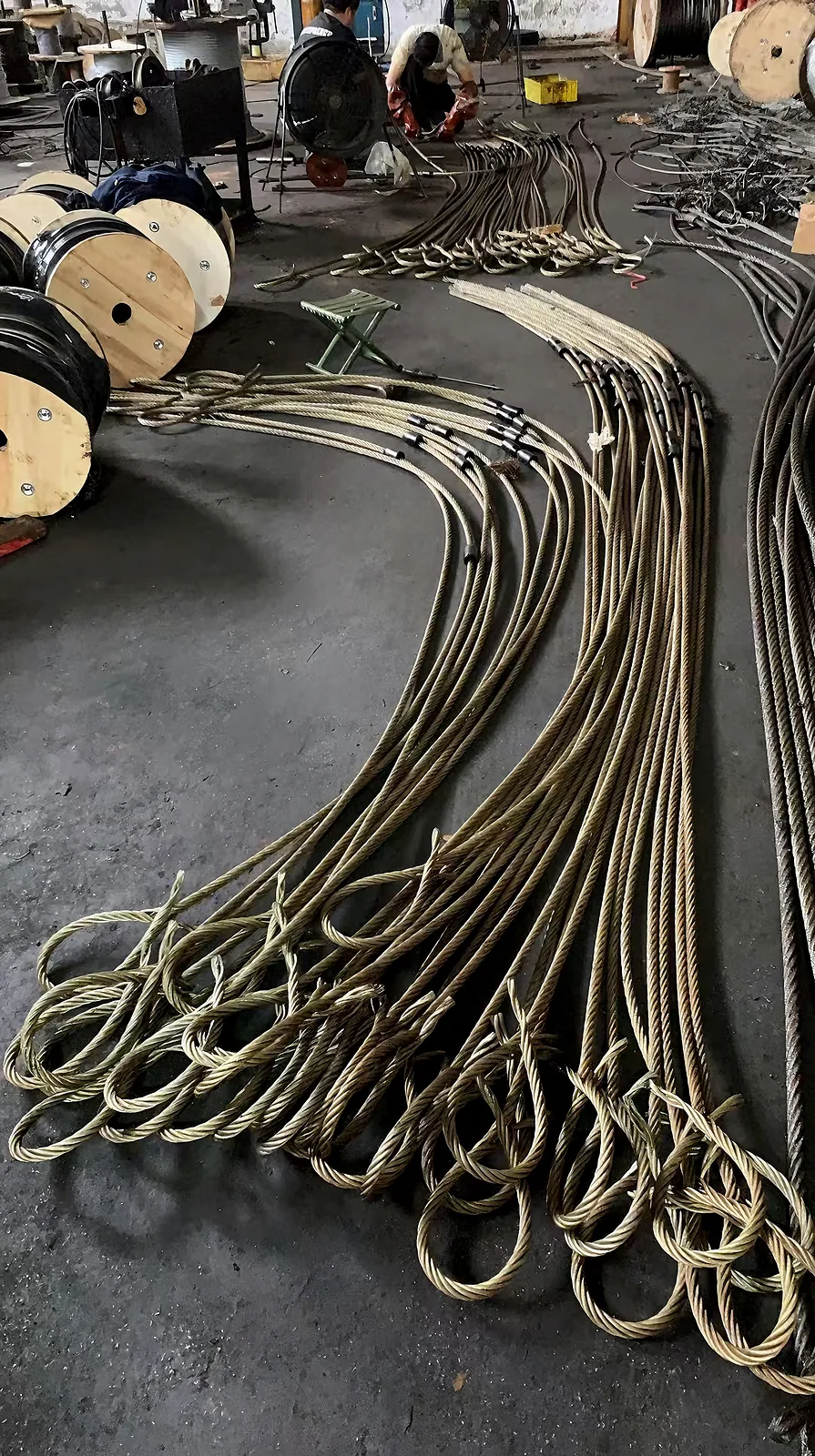 Completed wire rope sling assemblies